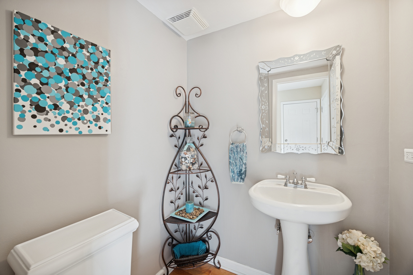 2618 Smith Street Rolling Meadows, IL 60008 - Photo 13 of 27 a bathroom with a sink toilet and a mirror