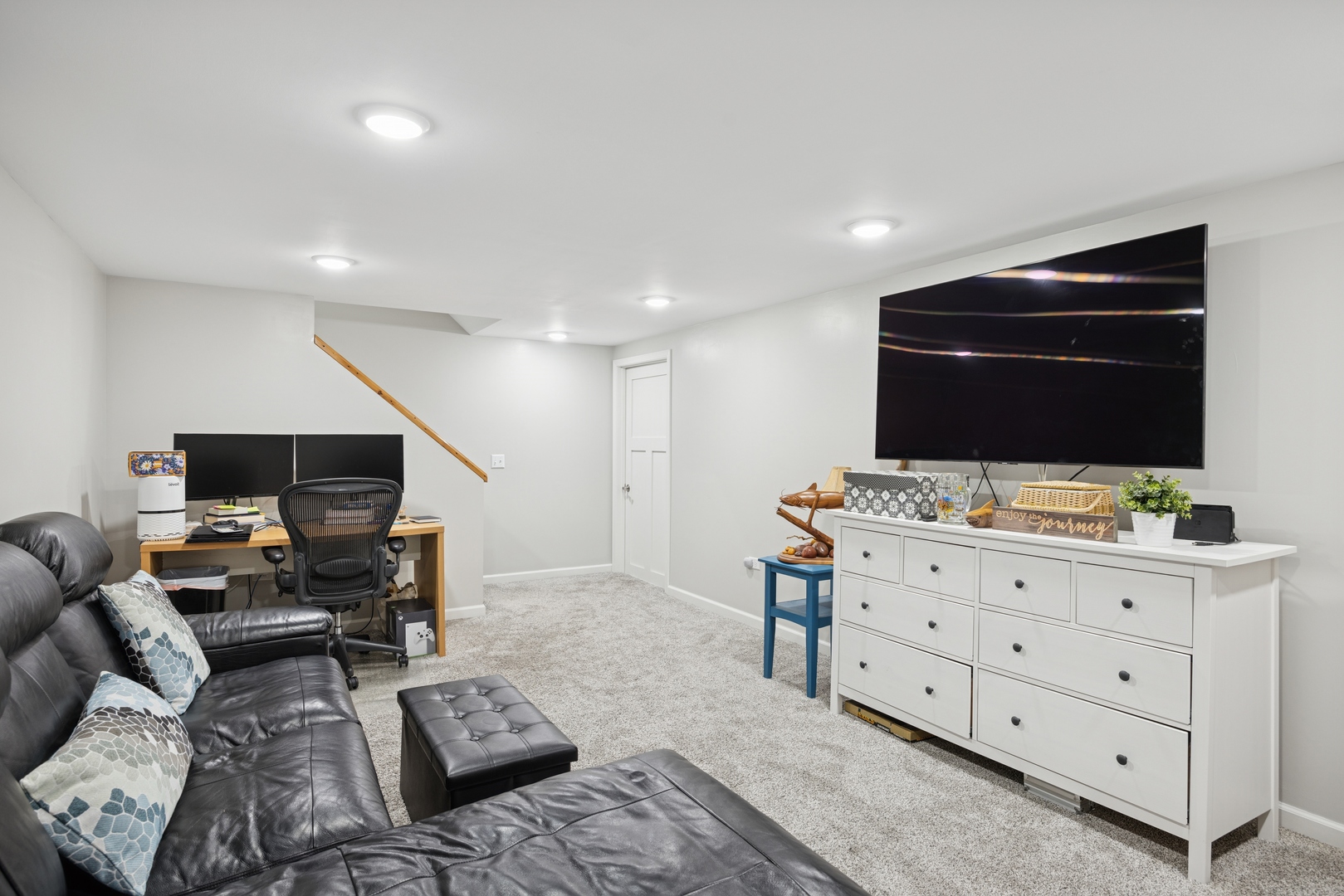2618 Smith Street Rolling Meadows, IL 60008 - Photo 21 of 27 a living room with furniture and a flat screen tv