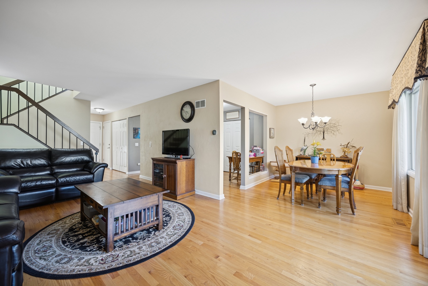 2618 Smith Street Rolling Meadows, IL 60008 - Photo 3 of 27 a living room with furniture and a wooden floor