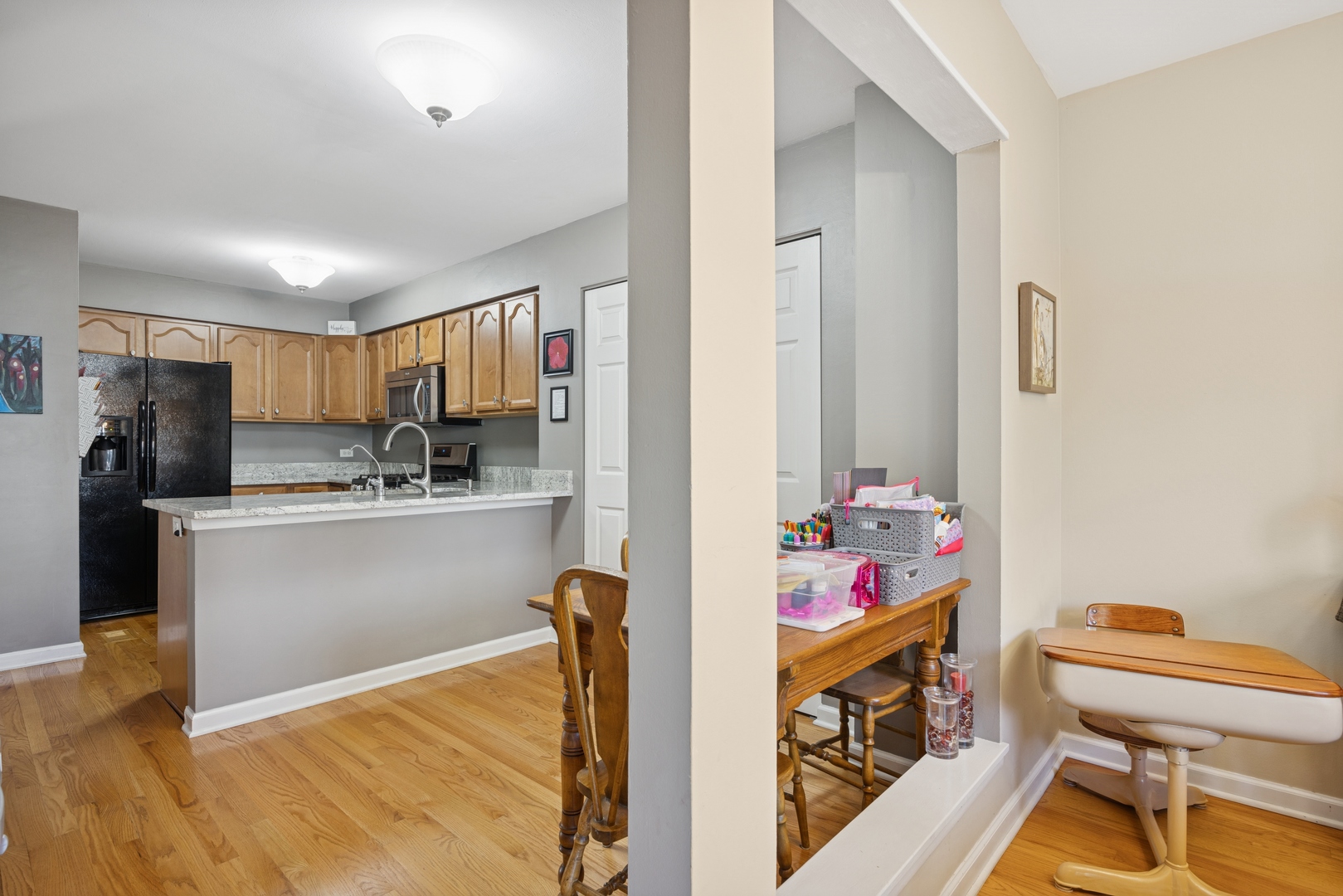 2618 Smith Street Rolling Meadows, IL 60008 - Photo 10 of 27 a view of kitchen with furniture and wooden floor