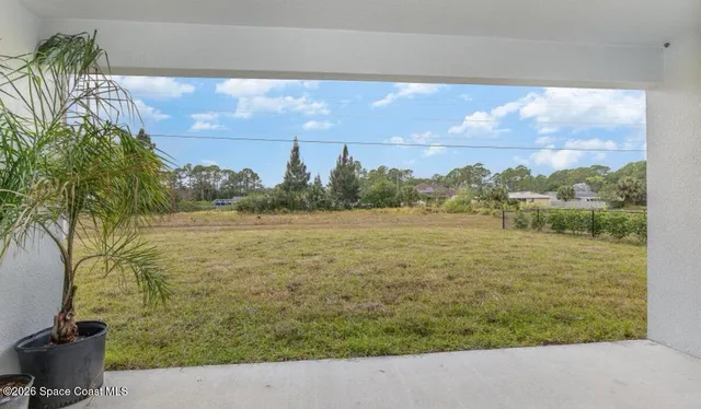 a view of a lake from a yard