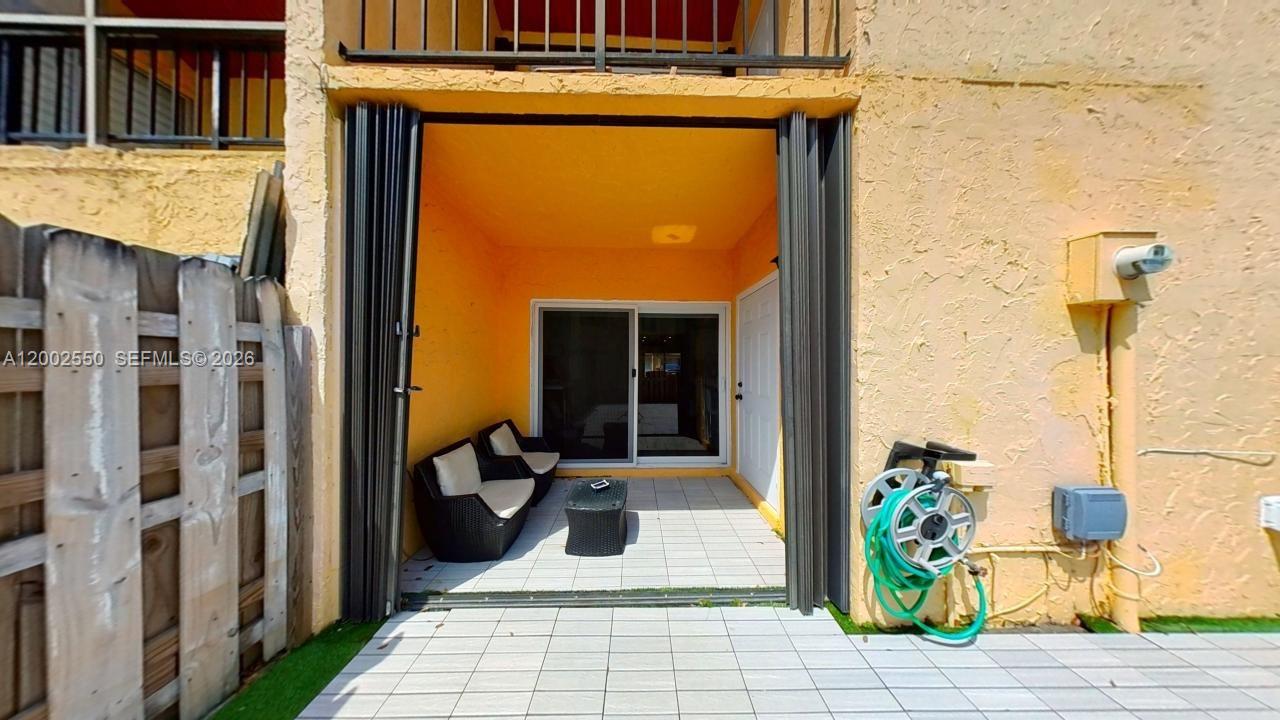 13731 Southwest 84th Street, Unit C11 Miami, FL 33143 - Photo 13 of 32 a view of a entryway door of the house