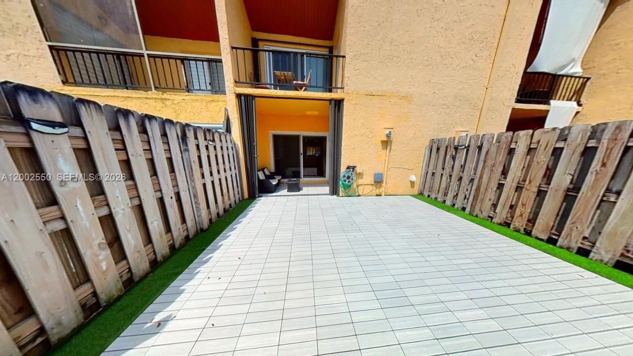 13731 Southwest 84th Street, Unit C11 Miami, FL 33143 - Photo 16 of 32 a view of a house with wooden floor