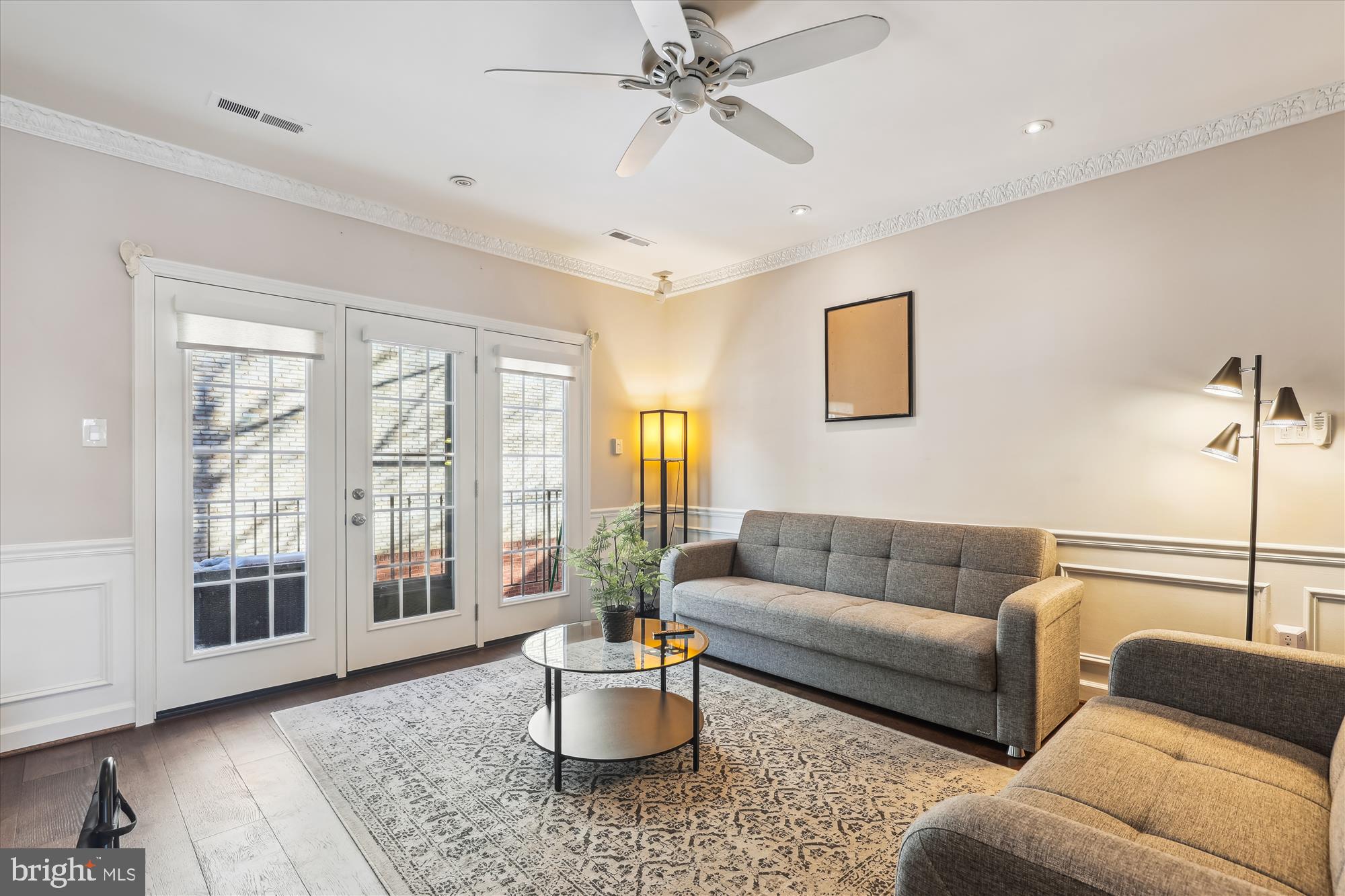 4611 1/2 MacArthur Boulevard Northwest, Unit B Washington, DC 20007 - Photo 17 of 43 a living room with furniture and a window