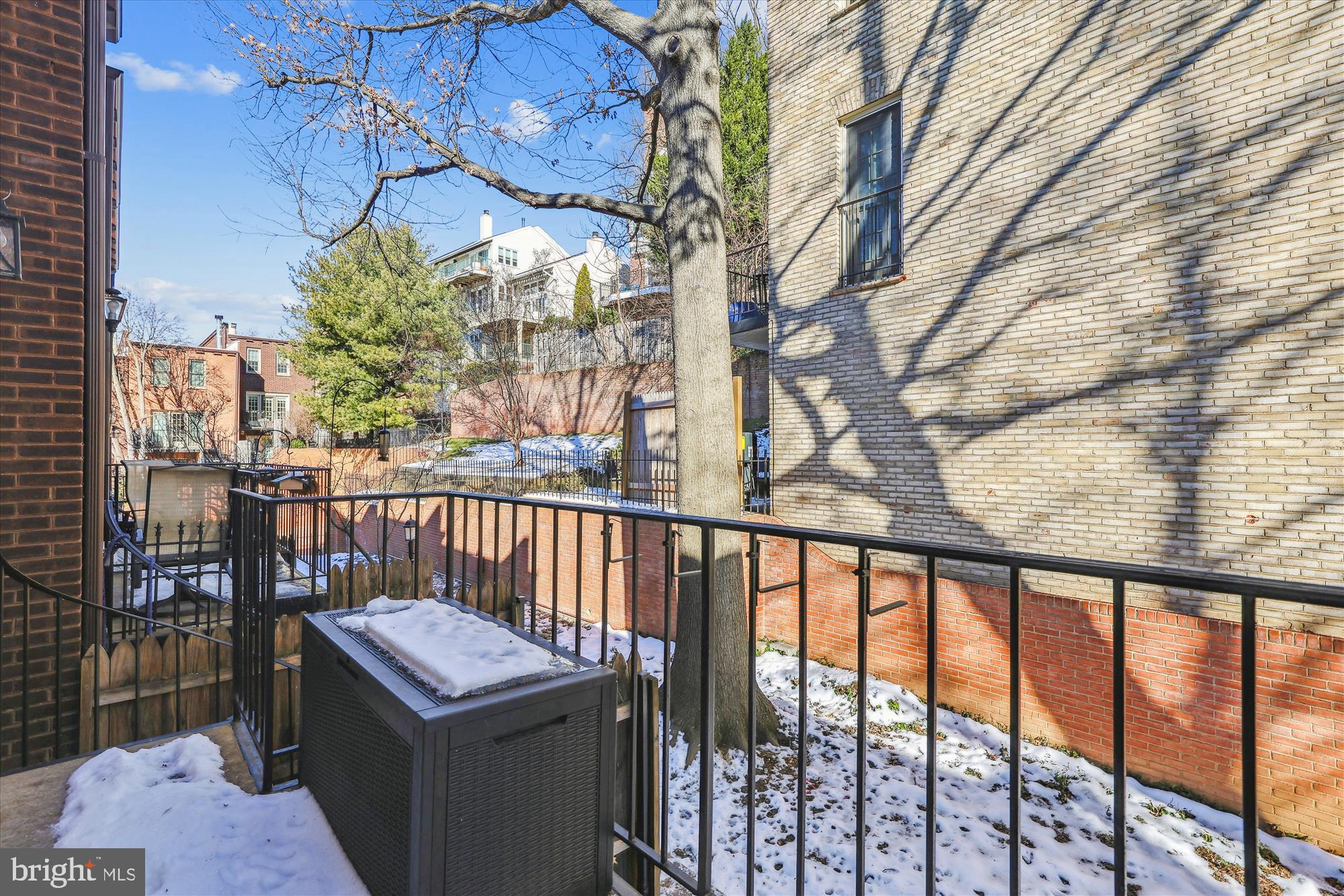 4611 1/2 MacArthur Boulevard Northwest, Unit B Washington, DC 20007 - Photo 36 of 43 a view of a balcony with wooden fence