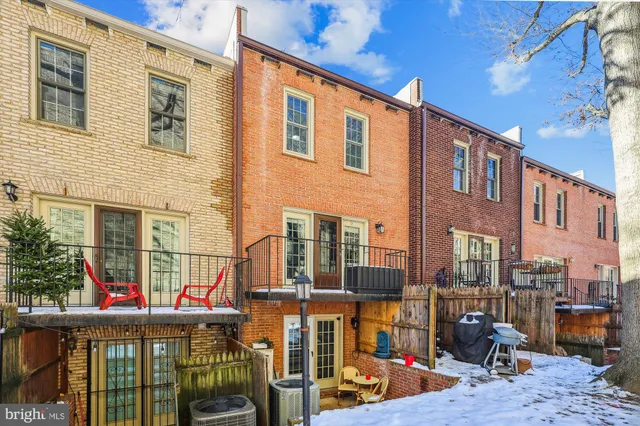 a front view of a building with glass windows