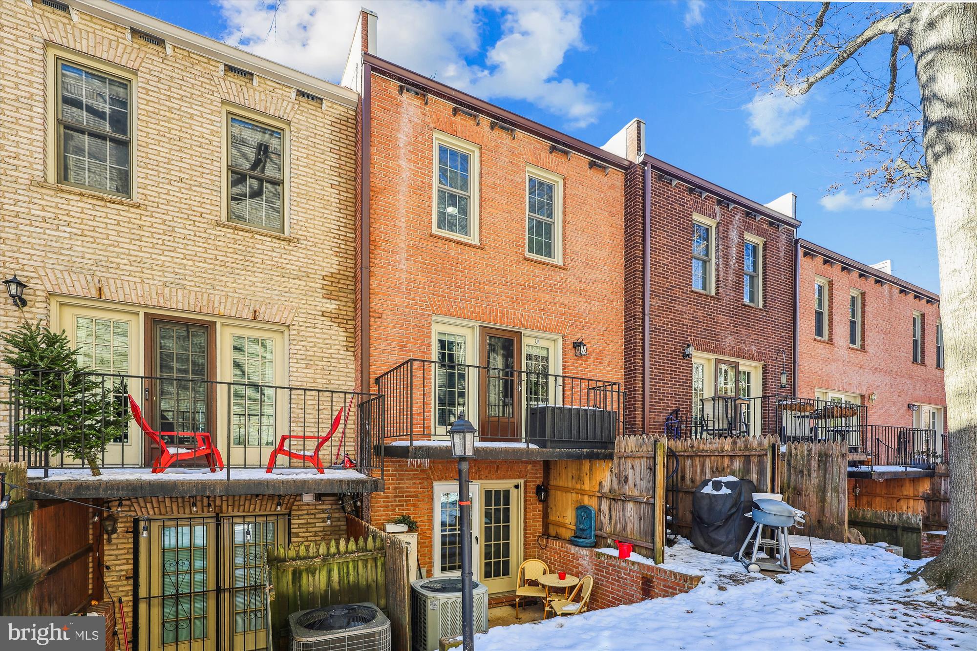 4611 1/2 MacArthur Boulevard Northwest, Unit B Washington, DC 20007 - Photo 39 of 43 a front view of a building with glass windows