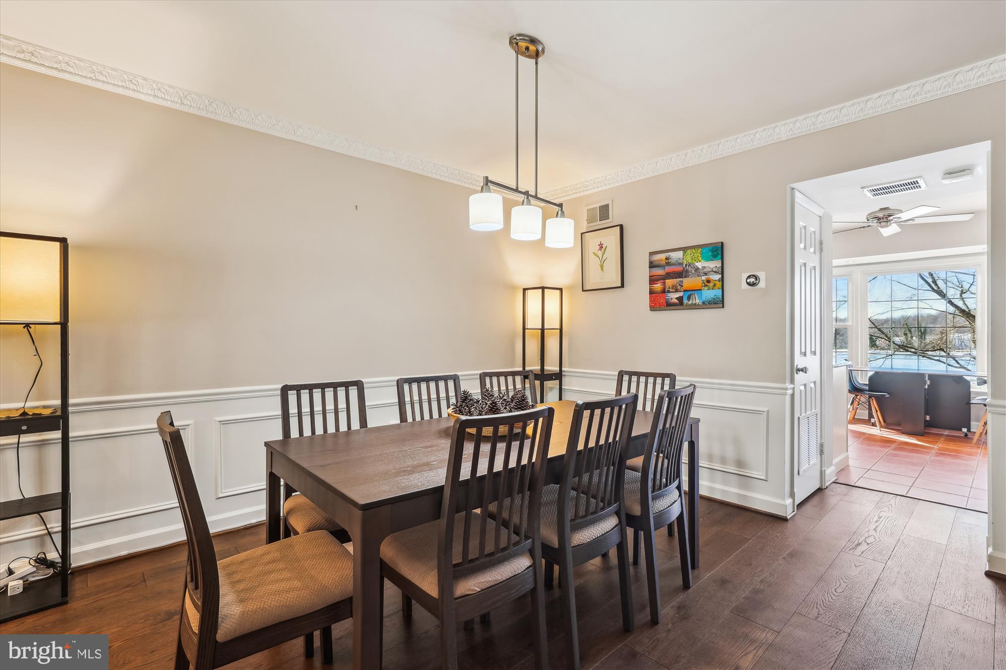 4611 1/2 MacArthur Boulevard Northwest, Unit B Washington, DC 20007 - Photo 9 of 43 a view of a dining room with furniture window and wooden floor