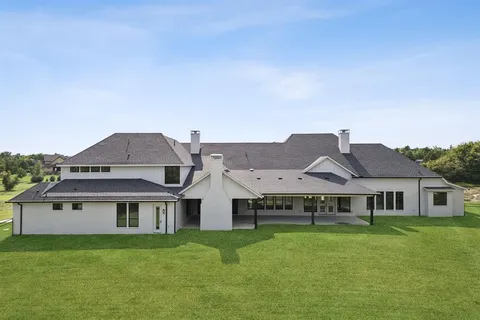 a view of a house with garden