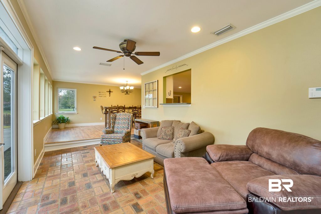 15710 Old Pierce Road Fairhope, AL 36532 - Photo 8 of 38 Den with Double Door Leading to Pool and Patio