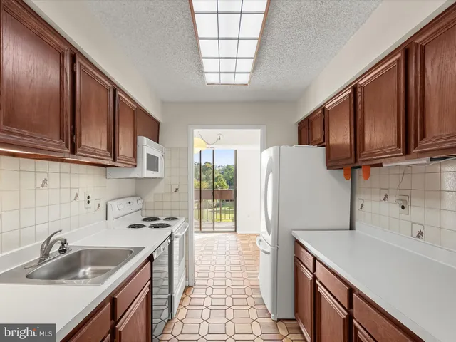 a view of balcony with wooden floor