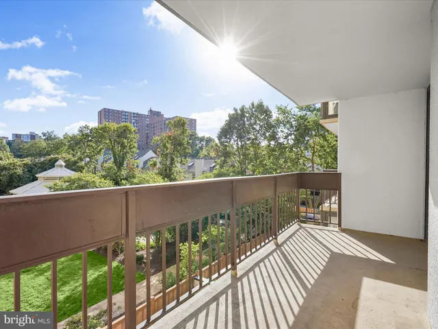 a bathroom with a toilet a sink and a mirror