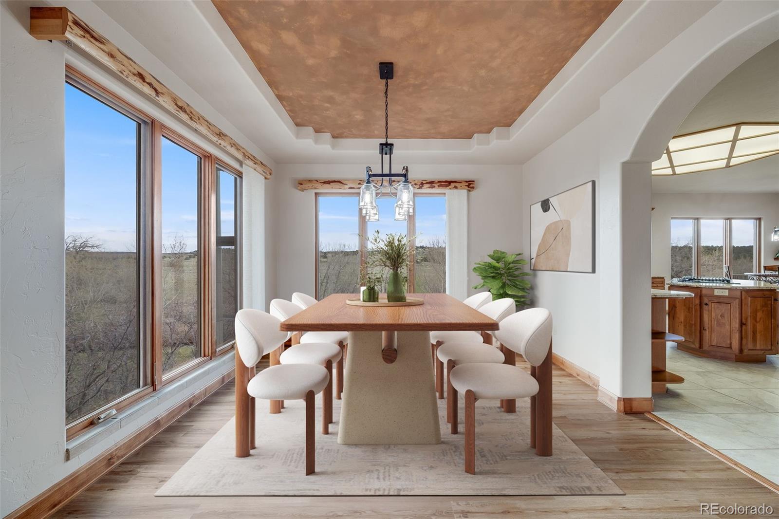185 River Ridge Trail Walsenburg, CO 81089 - Photo 12 of 50 a dining room with furniture a chandelier and wooden floor
