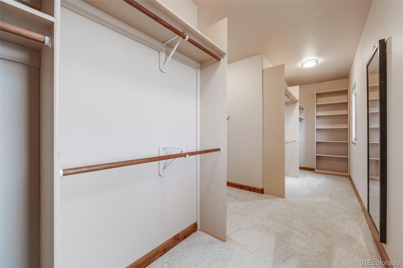 185 River Ridge Trail Walsenburg, CO 81089 - Photo 26 of 50 a view of walk in closet with empty racks