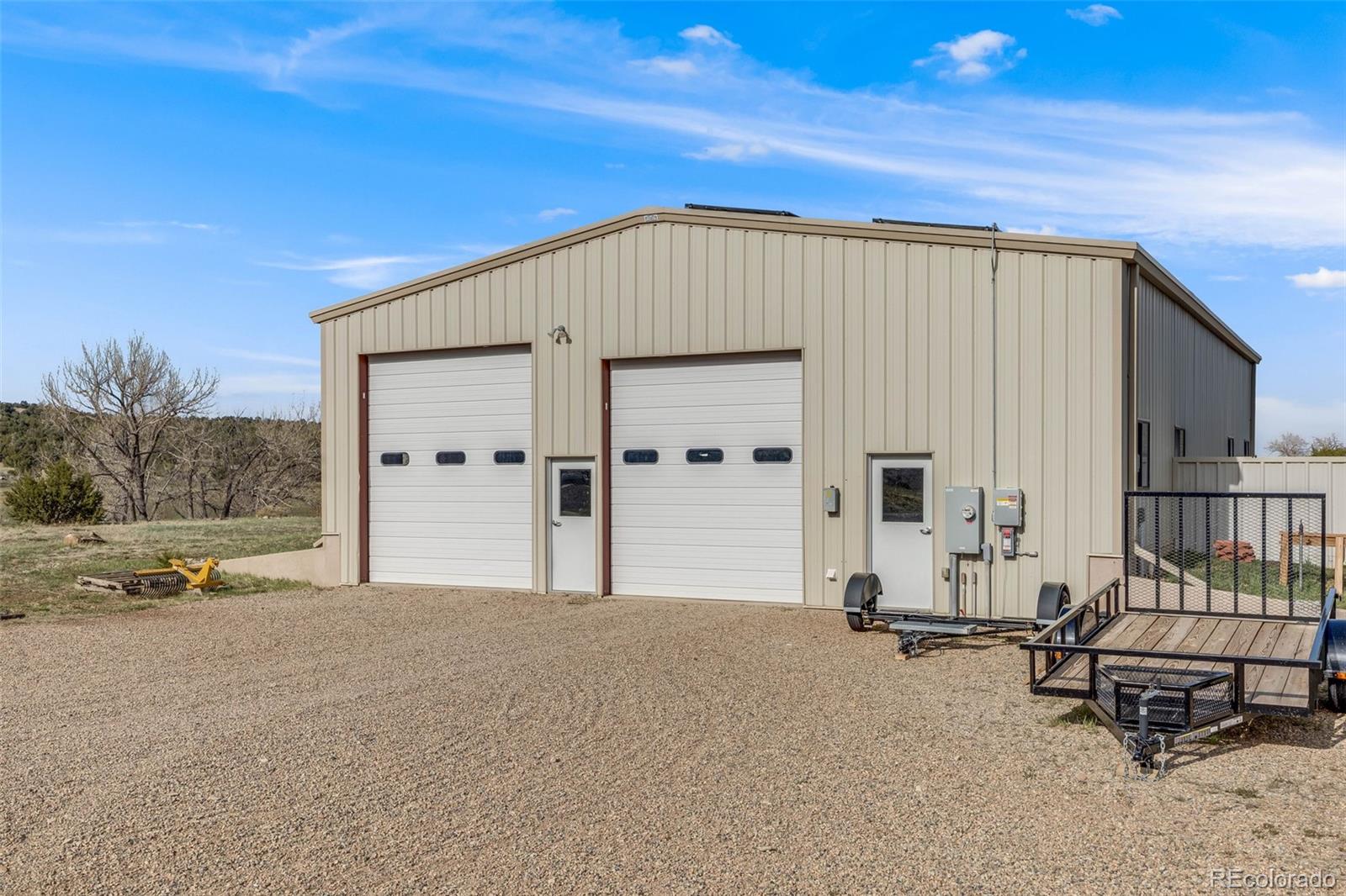 185 River Ridge Trail Walsenburg, CO 81089 - Photo 39 of 50 a view of a house with backyard and sitting area
