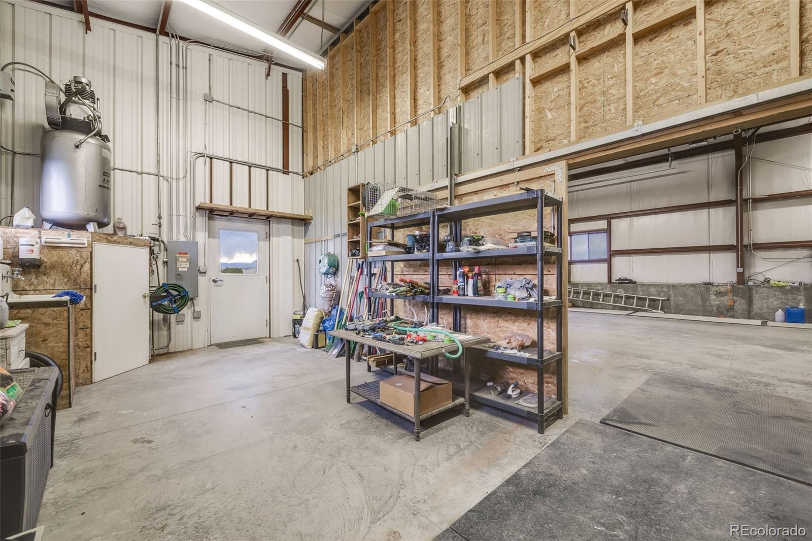 185 River Ridge Trail Walsenburg, CO 81089 - Photo 43 of 50 a view of a chairs with racks on the wall