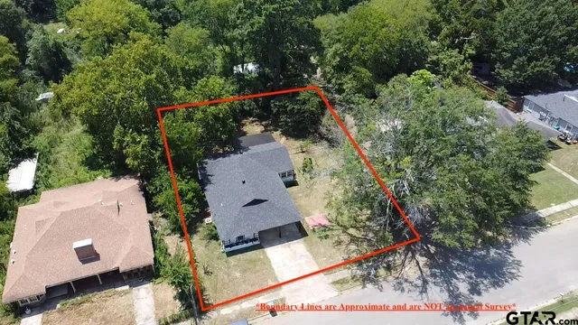 an aerial view of a house having outdoor space