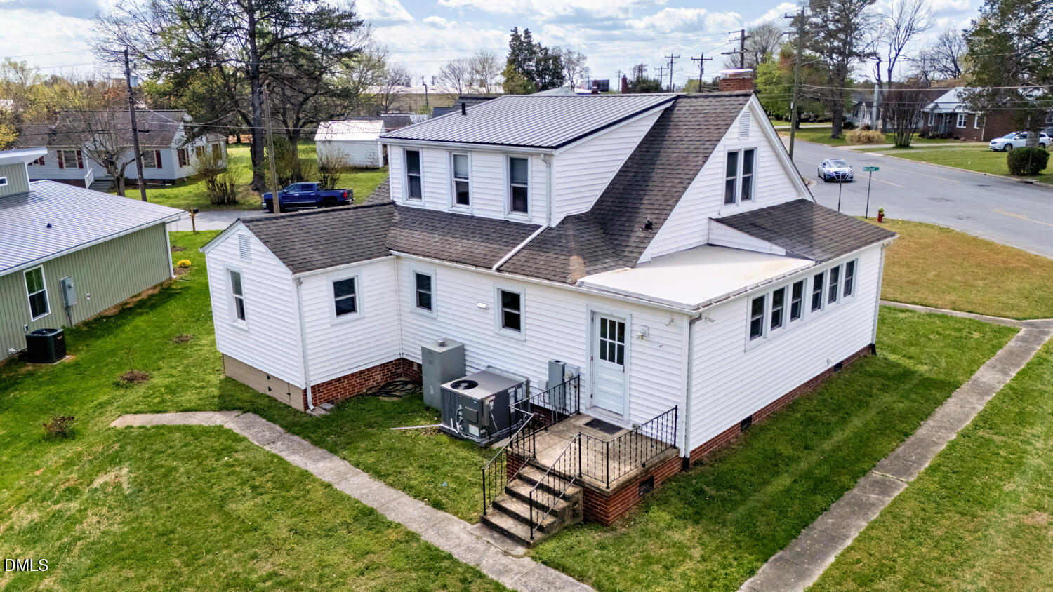 414 South Maple Street Graham, NC 27253 - Photo 40 of 42 a aerial view of a house with a yard and deck