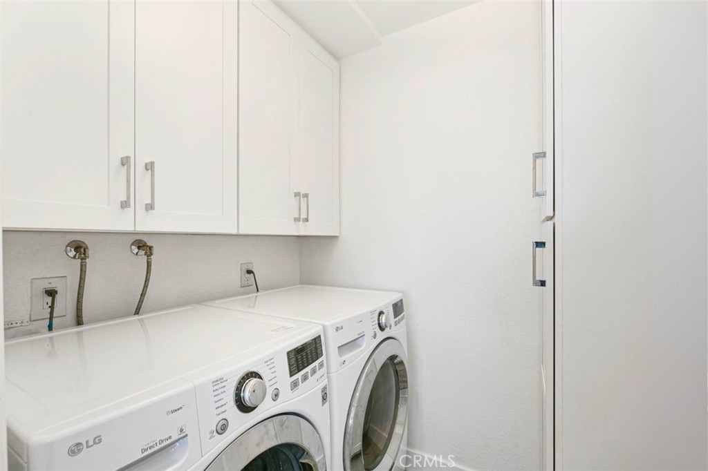121 Boca De La Playa, Unit 1 San Clemente, CA 92672 - Photo 16 of 47 a utility room with dryer and washer
