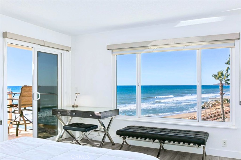 121 Boca De La Playa, Unit 1 San Clemente, CA 92672 - Photo 23 of 47 a living room with furniture a rug and a window