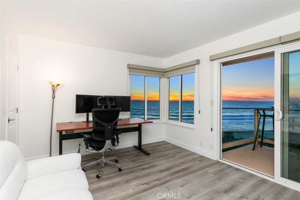 121 Boca De La Playa, Unit 1 San Clemente, CA 92672 - Photo 30 of 47 a view of a workspace with furniture and a window