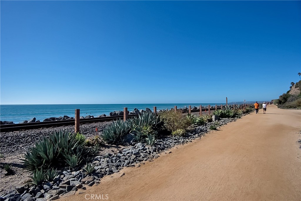 121 Boca De La Playa, Unit 1 San Clemente, CA 92672 - Photo 38 of 47 a view of a pathway both side of building