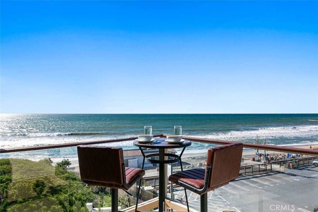 121 Boca De La Playa, Unit 1 San Clemente, CA 92672 - Photo 4 of 47 a view of a lake with outdoor space