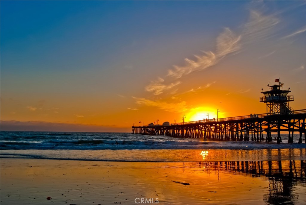121 Boca De La Playa, Unit 1 San Clemente, CA 92672 - Photo 42 of 47 a view of swimming pool and an outdoor seating