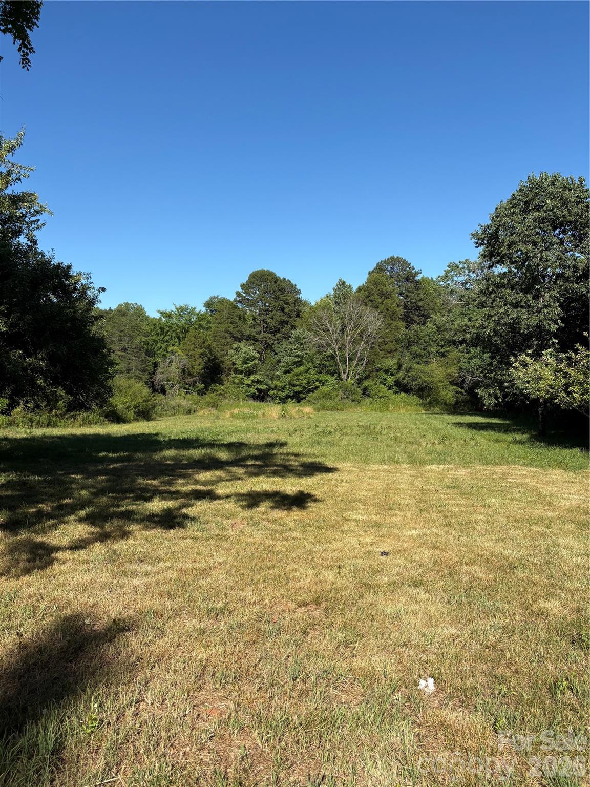 1105 John Miller Road Rockwell, NC 28138 - Photo 18 of 19 a view of a lake with a yard