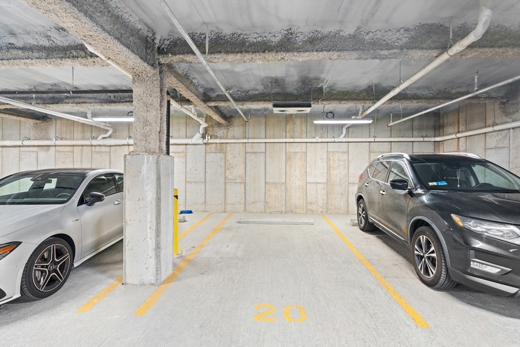 60 Coppersmith Way, Unit 407 Canton, MA 02021 - Photo 24 of 34 a view of a car in garage