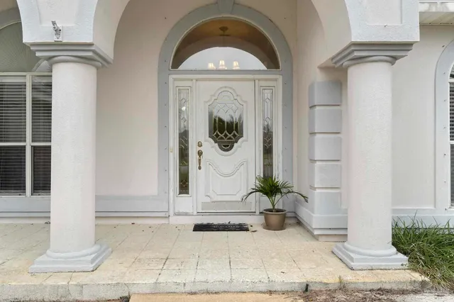 a view of a entryway door of the house