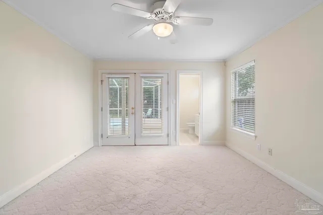 a bathroom with a sink mirror vanity and toilet
