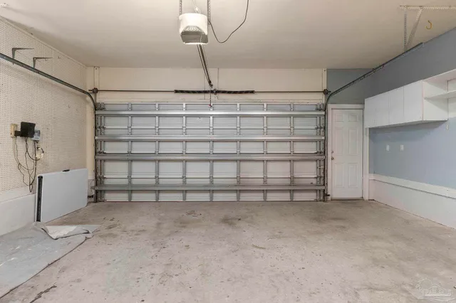 a living room with furniture rug and window