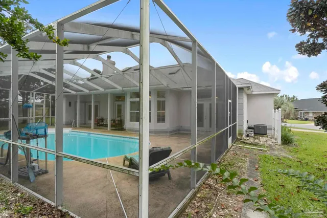 a view of a house with swimming pool