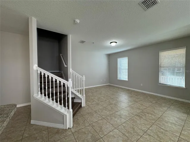 a view of entryway with stairs