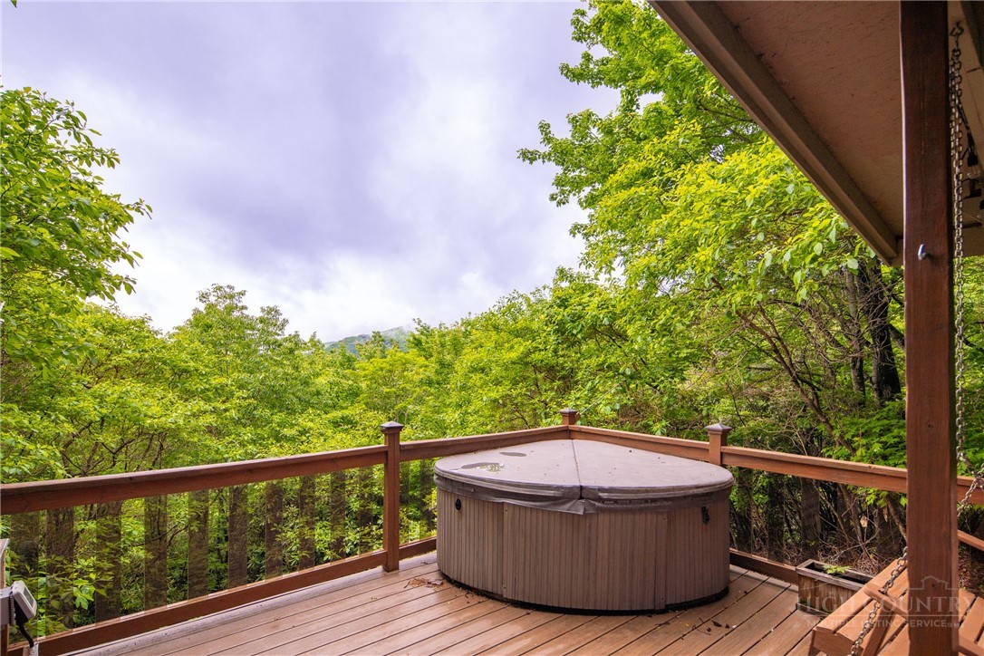 280 Chinkapin Ridge Road Seven Devils, NC 28604 - Photo 25 of 40 a view of a balcony with mountain view