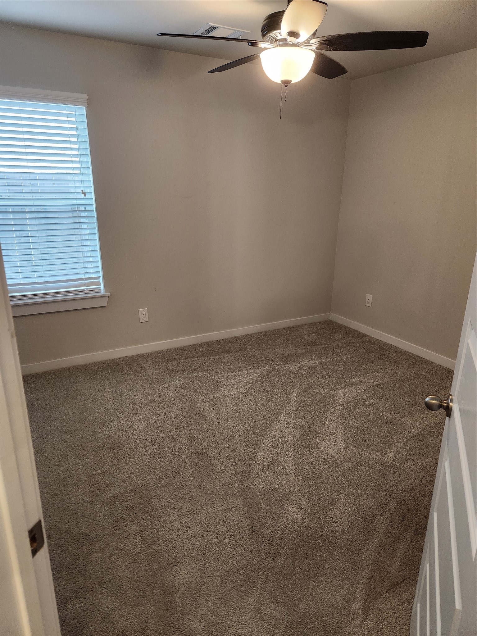 4326 Wyanngate Drive Spring, TX 77373 - Photo 29 of 29 en empty room with window and fan