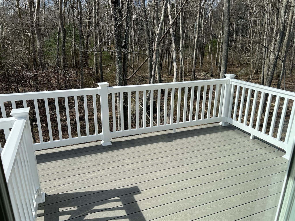 40 A Titus Way, Unit 40A Taunton, MA 02780 - Photo 15 of 16 a view of deck with a chair