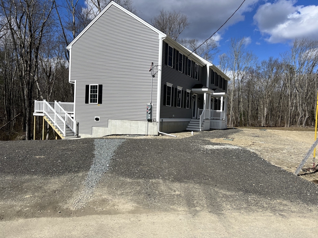 40 A Titus Way, Unit 40A Taunton, MA 02780 - Photo 2 of 16 a view of a house with a snow on the road