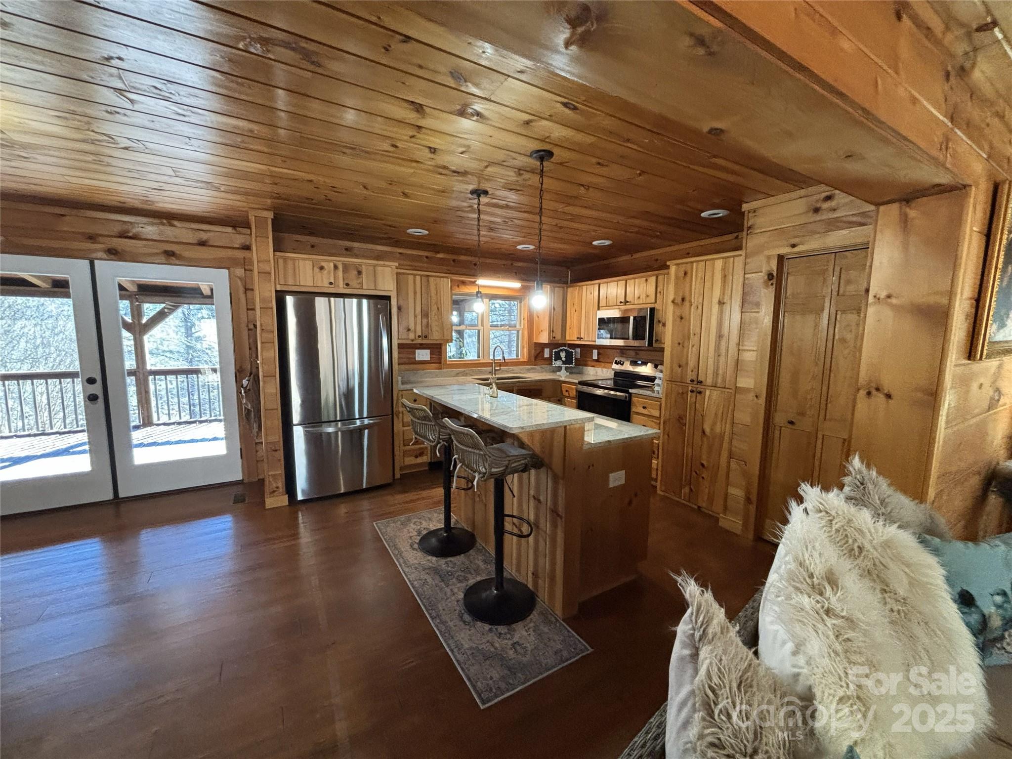 926 Cross Creek Drive Rutherfordton, NC 28139 - Photo 5 of 25 a kitchen with stainless steel appliances granite countertop a sink a stove and a refrigerator