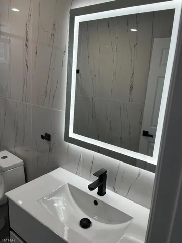 a bathroom with a sink and a toilet