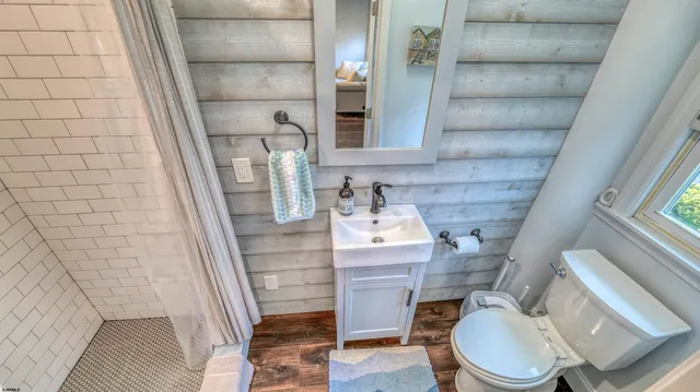 a bathroom with a sink and toilet