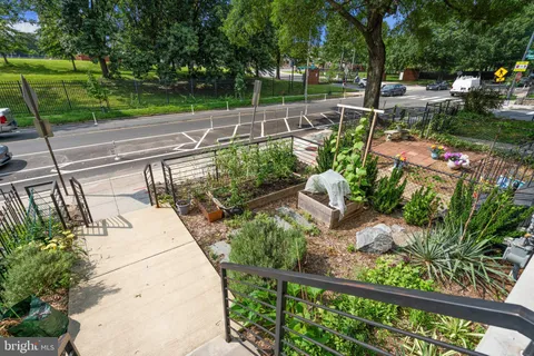 a view of a garden with patio
