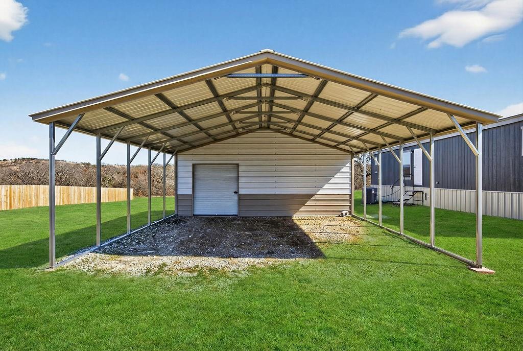 154 Firefly Drive Springtown, TX 76082 - Photo 37 of 39 a view of a backyard