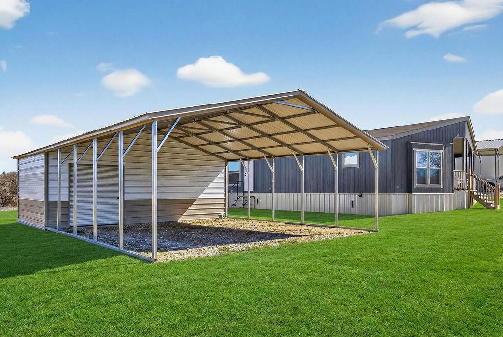 154 Firefly Drive Springtown, TX 76082 - Photo 38 of 39 a view of a house with a backyard and a patio