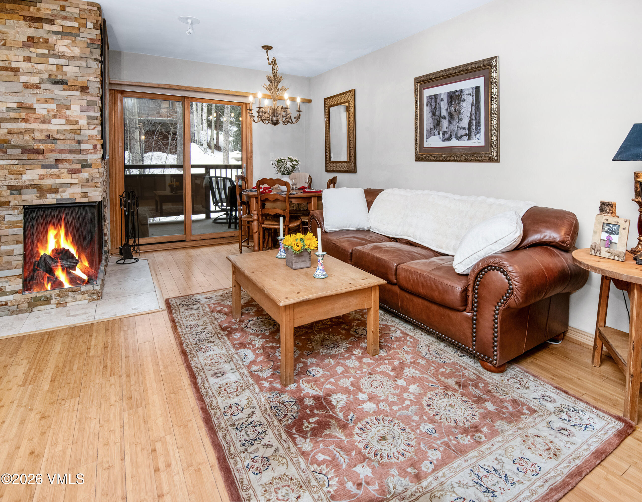 1650 Fall Ridge Road, Unit 202 Vail, CO 81657 - Photo 5 of 32 a living room with furniture and a fireplace