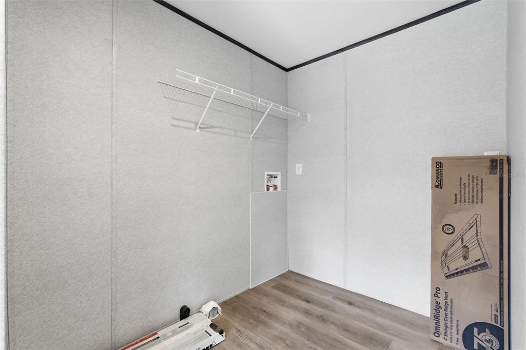 16837 Lashua Drive Spring Hill, FL 34610 - Photo 23 of 37 a view of an empty walk in closet