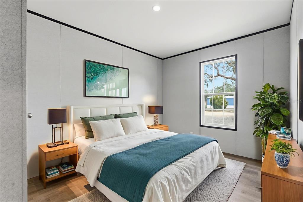 16837 Lashua Drive Spring Hill, FL 34610 - Photo 9 of 37 a bedroom with bed and a window