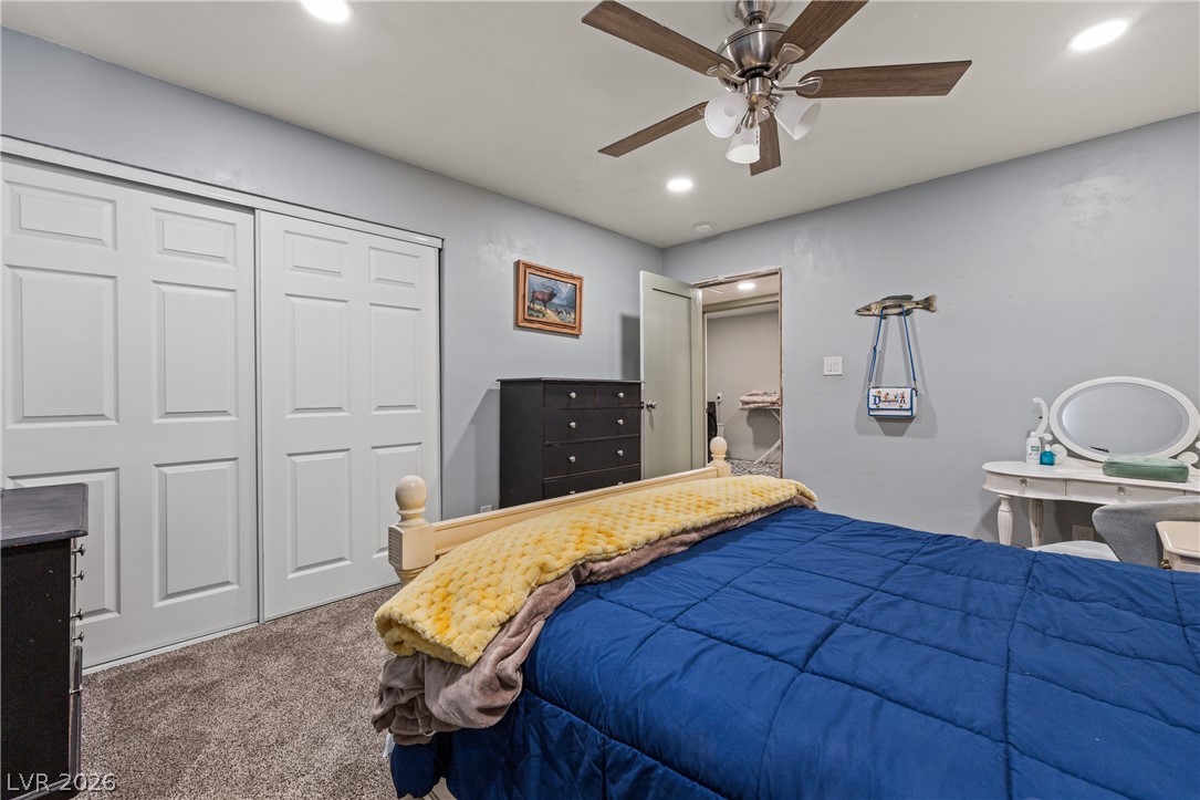 750 Leming Avenue Overton, NV 89040 - Photo 50 of 82 This cozy bedroom features ample closet space and a ceiling fan, offering comfortable living.