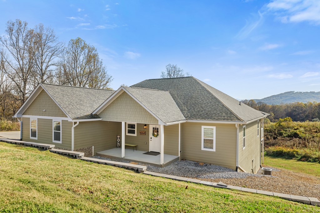 308 Mystic Ridge Blairsville, GA 30512 - Photo 22 of 68 a front view of a house with a yard